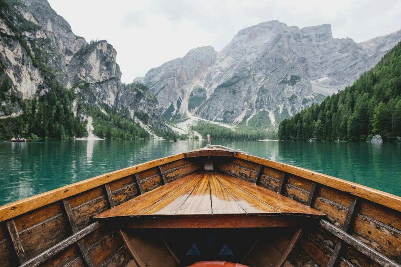 A lake and mountains. Stock photography, not a confirmed travel benefit.